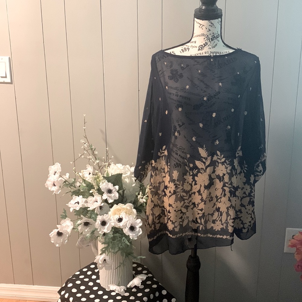 Chiffon asymmetrical blouse.